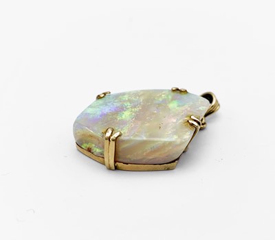 Lot 158 - An opal pendant mounted in 18ct gold by...