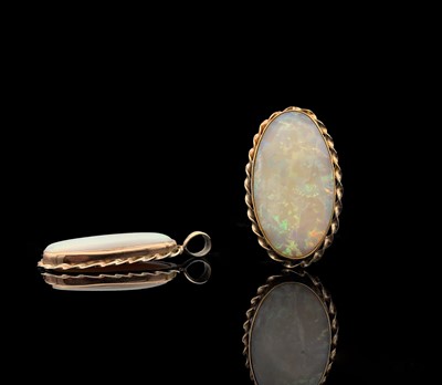 Lot 277 - Two gold rope-twist mounted opal pendants 12.6gm