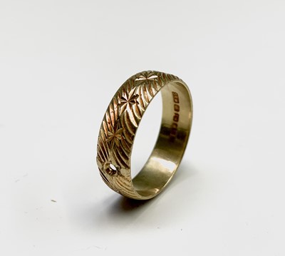 Lot 374 - An 18ct gold band 5.6gm, a ladies 9ct gold...