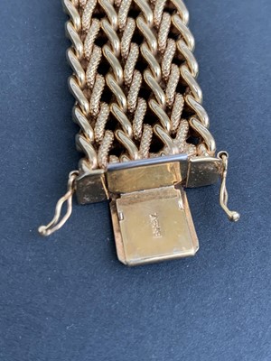 Lot 295 - A 9ct gold mesh bracelet width 19mm 35.4gm