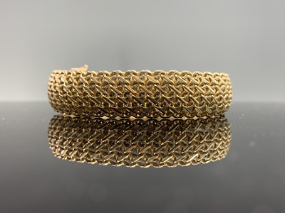 Lot 64 - A 9ct gold bracelet width 13.17mm 30.8gm