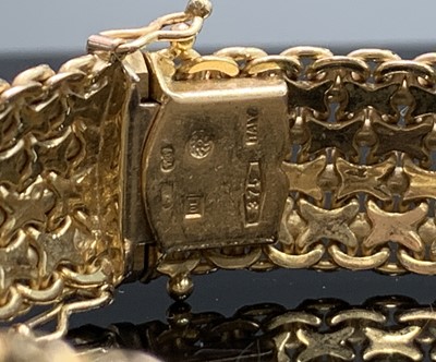 Lot 64 - A 9ct gold bracelet width 13.17mm 30.8gm
