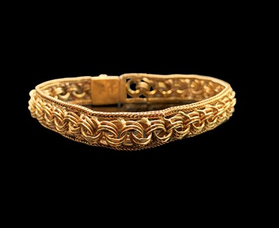 Lot 135 - A 9ct gold bracelet width 10.7mm 21.2gm
