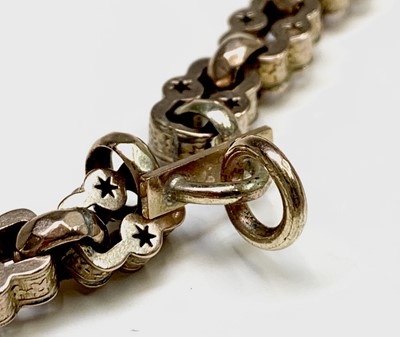 Lot 284 - A 9ct gold bracelet made from a pierced fancy...