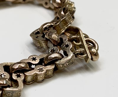 Lot 284 - A 9ct gold bracelet made from a pierced fancy...