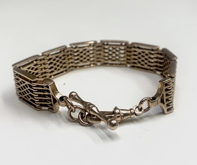 Lot 314 - A 9ct gold fretwork link bracelet 36.7gm