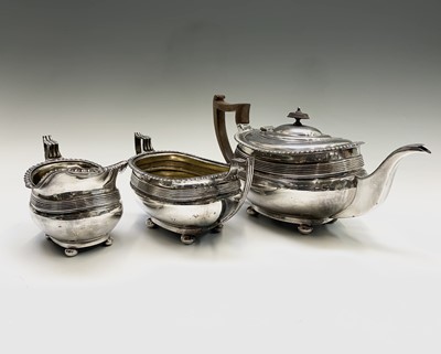 Lot 412 - A three piece silver plated tea set, Rd. No....