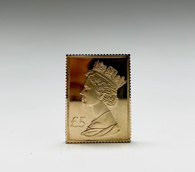 Lot 1030 - A set of seven silver-gilt replica stamps-...