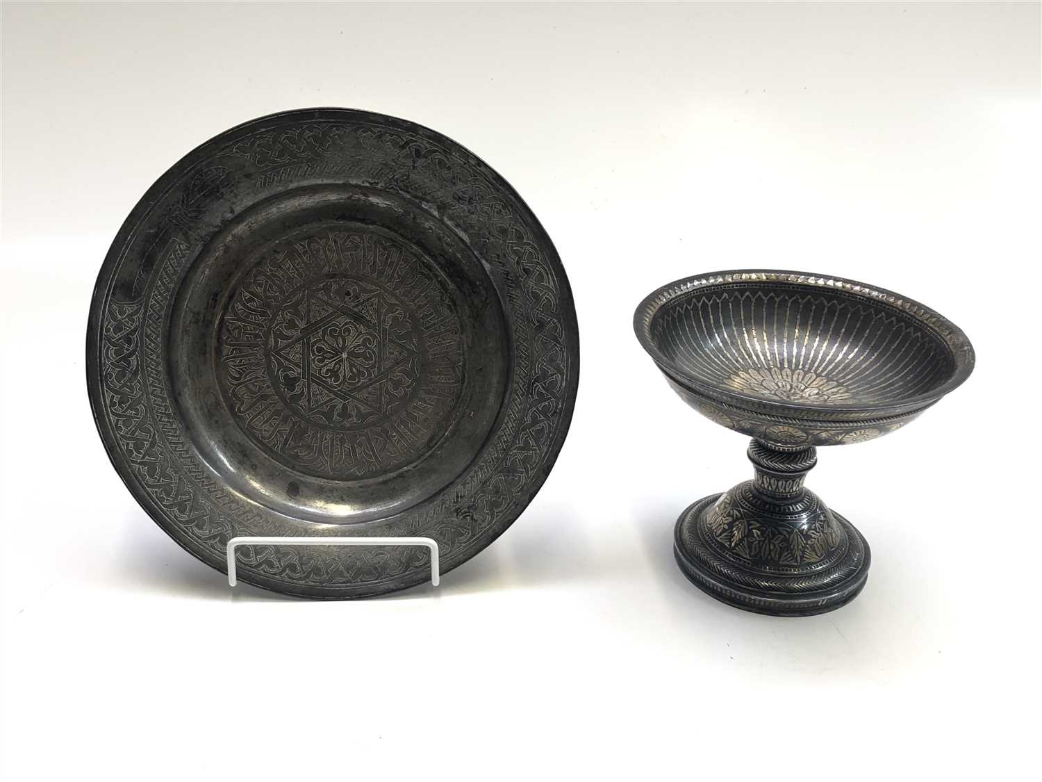 Lot 565 - A 19th century Bidri tazza, height 13cm and an...