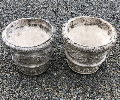 Lot 561 - A pair of reconstituted stone planters, cast...