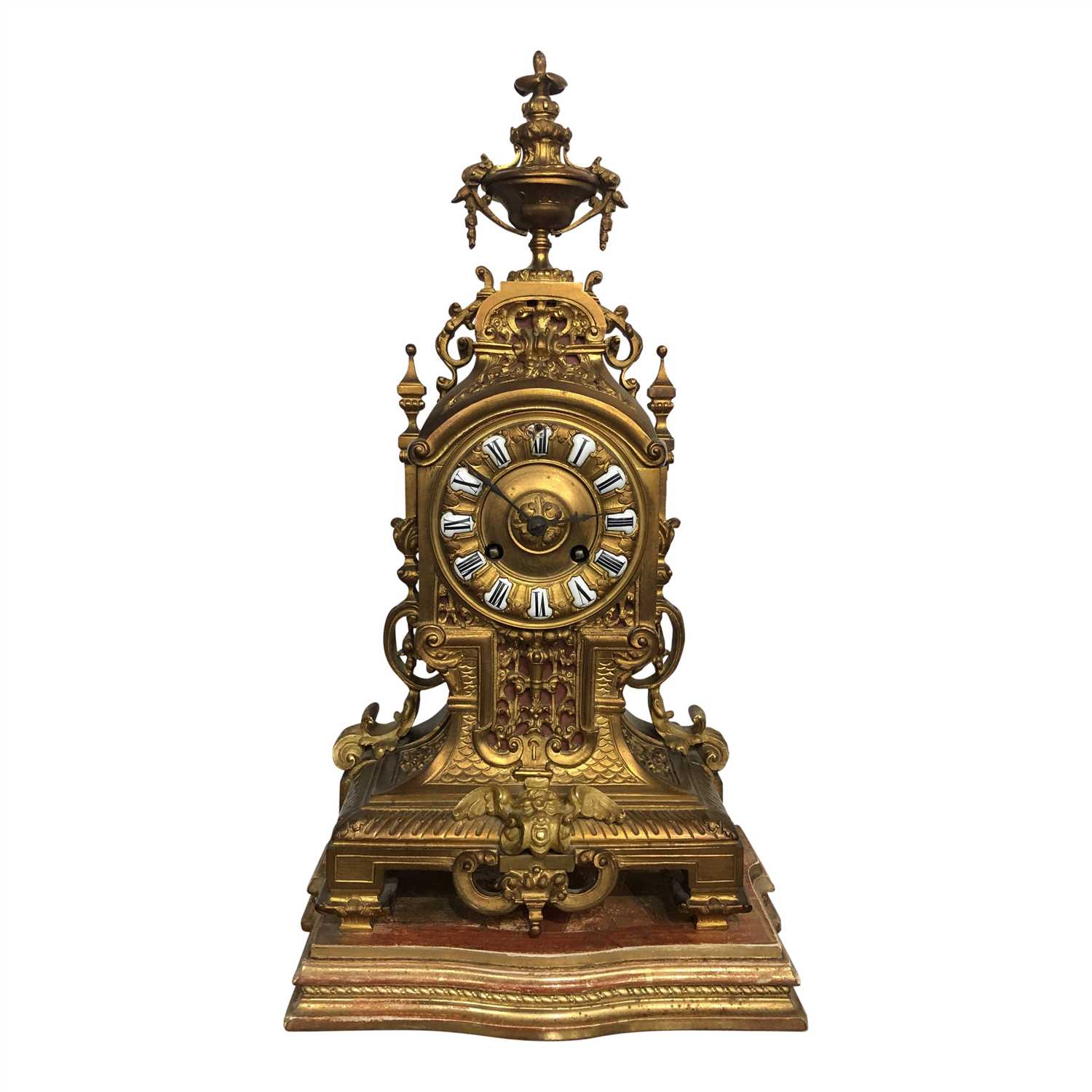 Lot 3006 - An ornate gilt-metal mantle clock, with white...