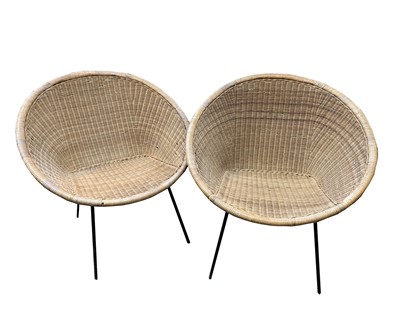 Lot 3247 - A pair of retro cane conservatory chairs, mid...