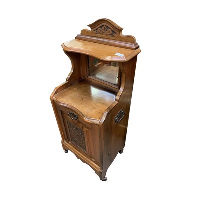 Lot 3248 - An Edwardian walnut coal purdonium, with...