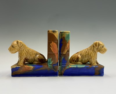 Lot 806 - A pair of Beswick bookends, each modelled with...