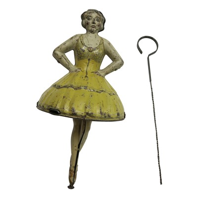 Lot 106 - An early 20th century tinplate clockwork toy...