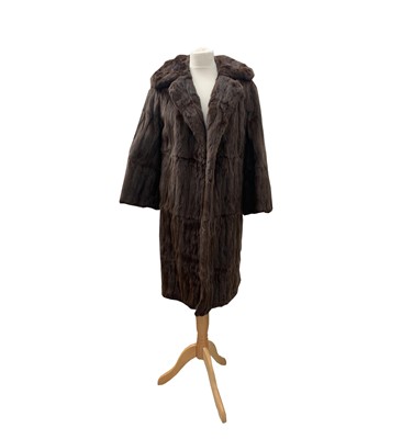 Lot 2842 - A long sable fur coat, lined in dark brown...