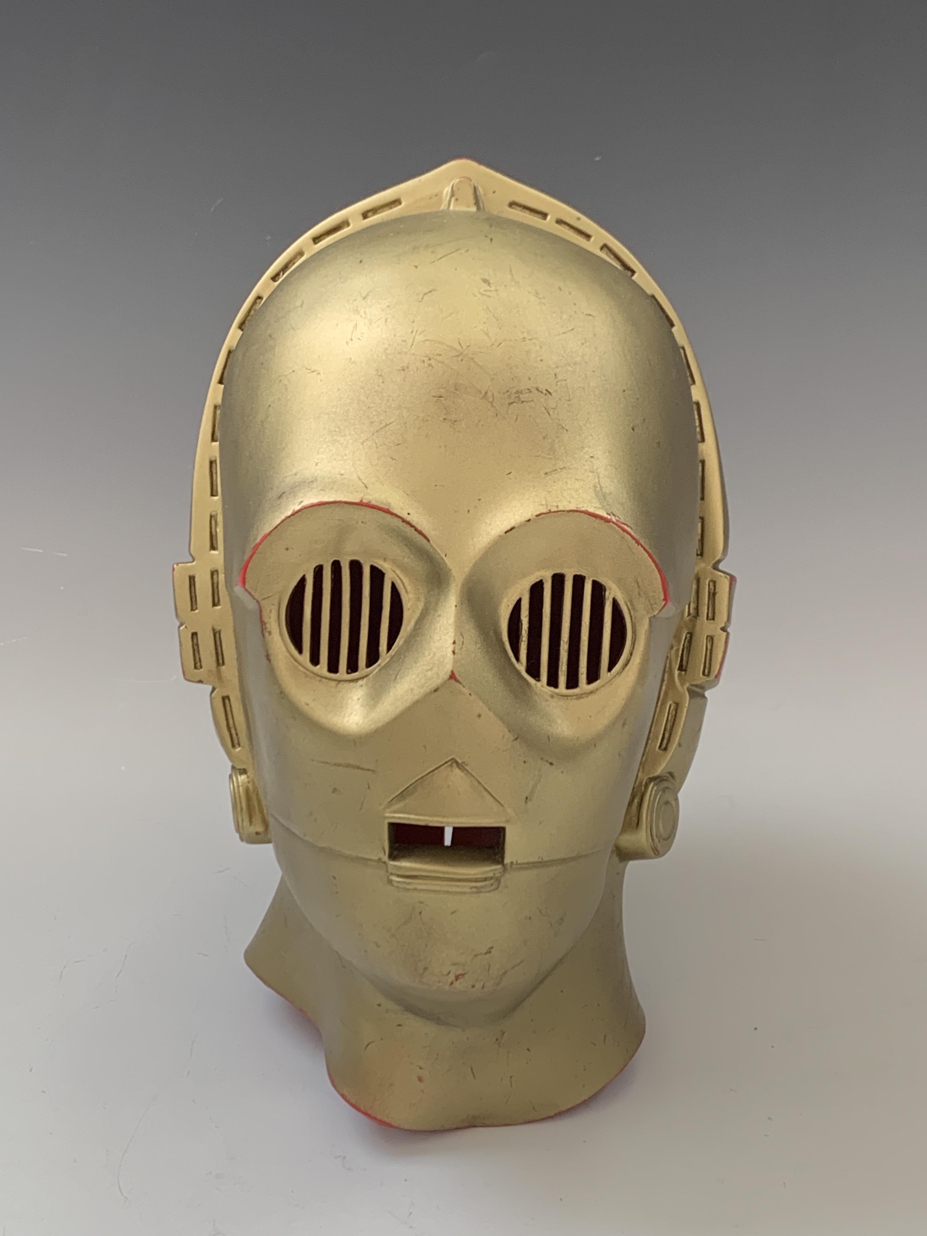 Cp30 Mask Lot 754 - A 1979 Star Wars C3PO gilt plastic mask