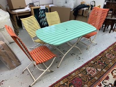 Lot 3256 - A retro garden table and four chairs, circa...