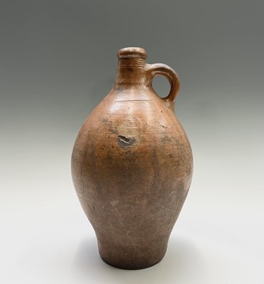 Lot 1099 - A 19th century French Sars pottery flagon....