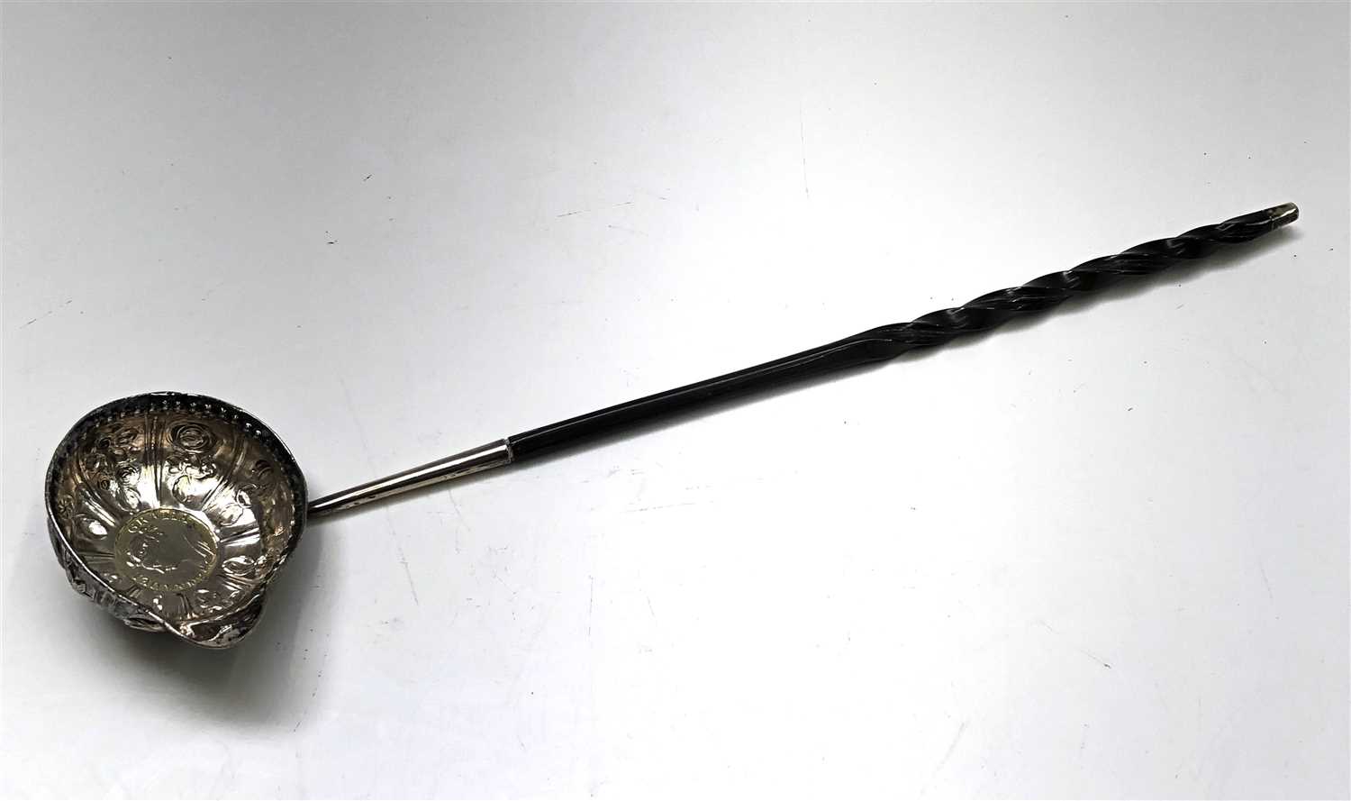 Lot 2166 - An 18th century silver punch ladle with...