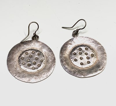 Lot 390 - A pair of Guy Royle silver sunflower disc...