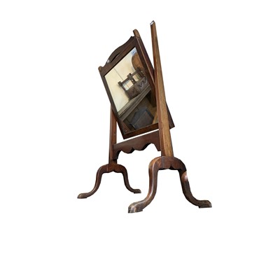 Lot 3277 - A Georgian style mahogany swing mirror on...