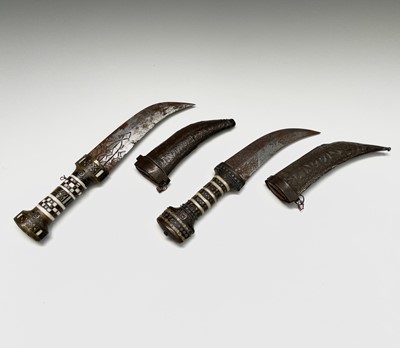 Lot 1032 - Two Middle Eastern daggers, circa 1900,...