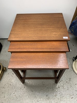 Lot 3279 - A nest of three mid-century teak occasional...