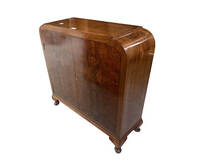 Lot 3282 - A 1930s burr walnut side cabinet, the two...