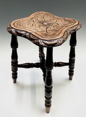 Lot 3283 - A reproduction oak low stool, with rising seat...