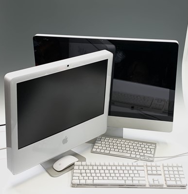 Lot 458 - Two Apple iMac computers, both with a keyboard,...