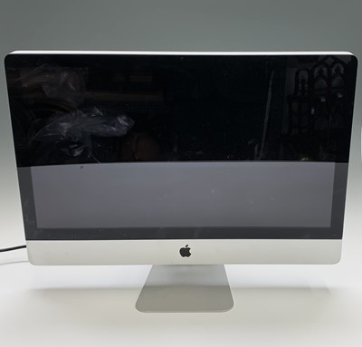 Lot 458 - Two Apple iMac computers, both with a keyboard,...