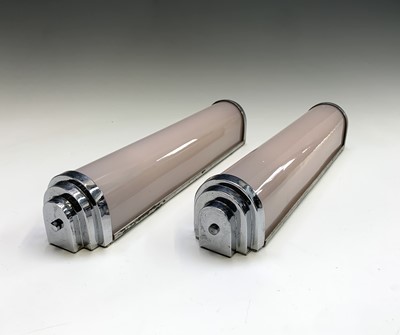 Lot 445 - A pair of Art Deco chrome and pink opaque...