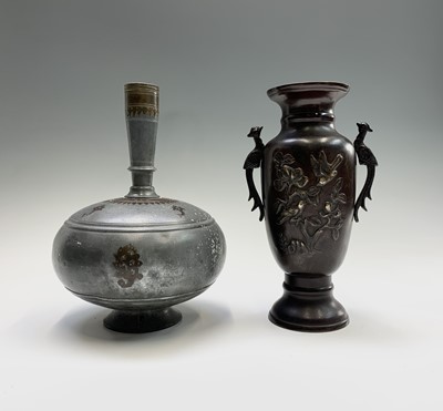 Lot 450 - A Middle Eastern bronze and metal bulbous vase,...