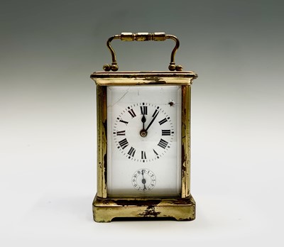 Lot 2938 - A French brass carriage clock, the white...