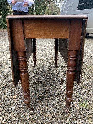 Lot 3293 - A Victorian mahogany drop leaf dining table,...