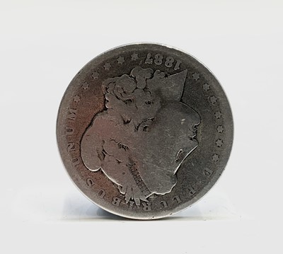 Lot 168 - A Victorian 1890 crown, a Morgan dollar 1887...