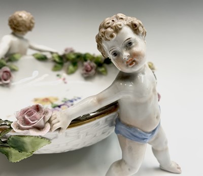 Lot 888 - A German porcelain centrepiece bowl, with...