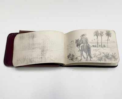 Lot 487 - An American brown leather pocket sketchbook,...