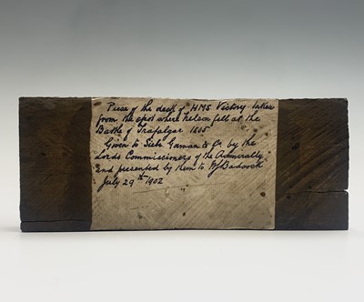 Lot 489 - An oak fragment of HMS Victory, with old ink...