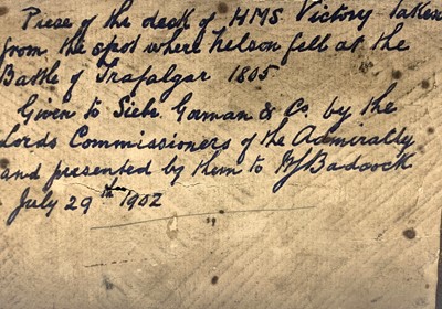 Lot 489 - An oak fragment of HMS Victory, with old ink...