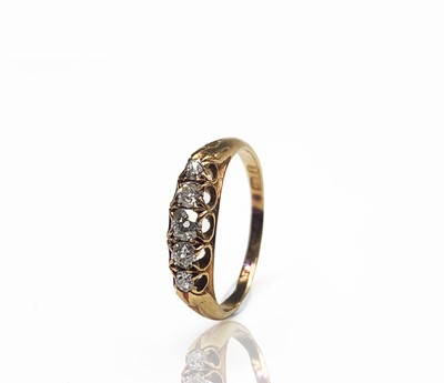 Lot 187 - An 18ct gold five stone diamond ring...