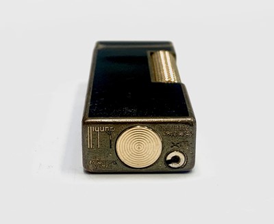 Lot 413 - A Dunhill Rollagas black lighter and a Beney...