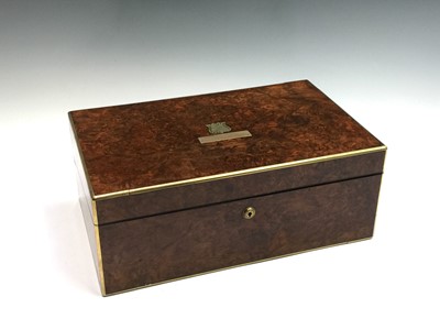 Lot 101 - A Victorian brass bound burr walnut writing...