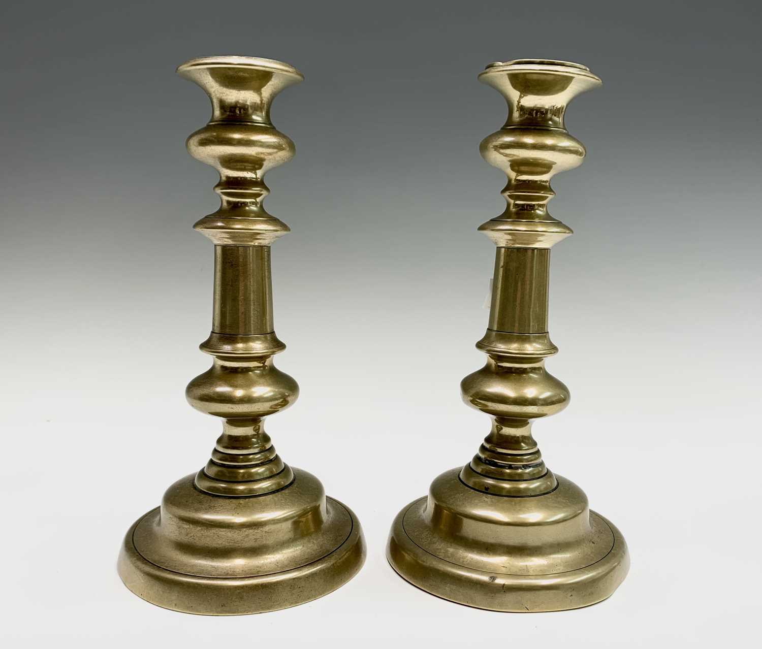 Lot 557 - A pair of 19th century brass circular...