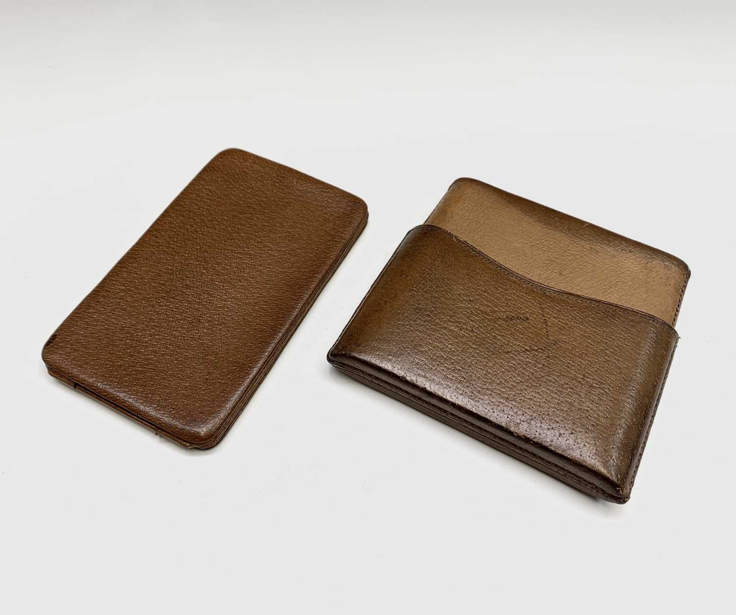 Lot 220 - A Dunhill leather cigarette case, width 16cm,