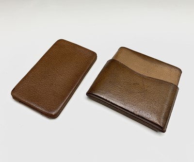 Lot 220 - A Dunhill leather cigarette case, width 16cm,...