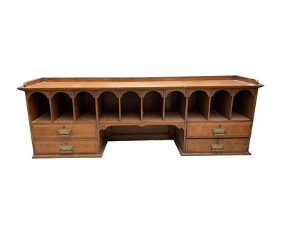 Lot 3137 - A late Victorian oak stationery rack, with...