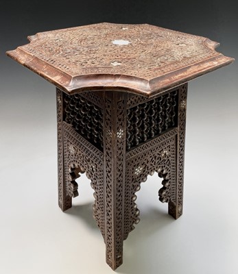 Lot 1015 - A Syrian carved wood occasional table, 19th...