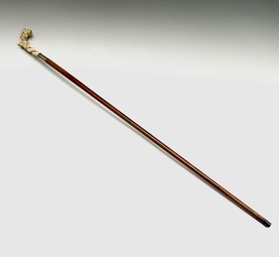 Lot 559 - A walking stick, with 19th century French...